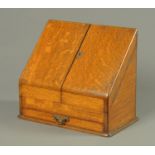 A Victorian oak stationery cabinet. Width 36.5 cm.