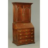 A Georgian oak bureau bookcase,