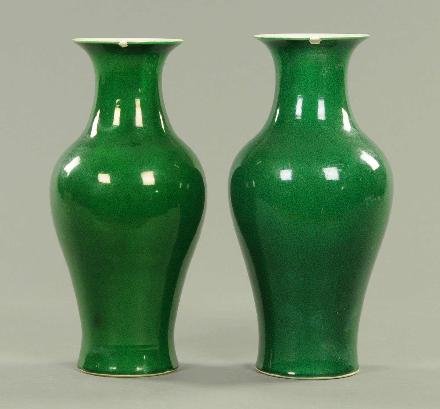 A pair of Chinese green vases, Yongzheng marks circa 1723-1735. Height 31 cm.