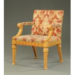 A giltwood Gainsborough style armchair, with pink and beige patterned upholstery,