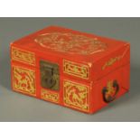 A Chinese red and gilt painted lacquered casket. Length 22 cm.