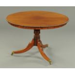 A 19th century mahogany breakfast table, with beaded edge and recessed frieze to centre column,