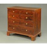 A George III mahogany chest of drawers,