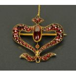 A Georgian garnet pendant brooch, with later safety chain, circa 1800.