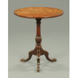 A George III mahogany tripod table, with circular top,