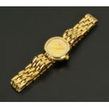 A Raymond Weil ladies wristwatch, 18 ct gold plated.