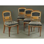 A set of four Edwardian inlaid mahogany occasional chairs,