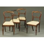 A set of four Victorian rosewood dining chairs,