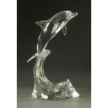A Swarovski crystal dolphin, on wave, Michael Stamey. Height 20 cm, boxed.