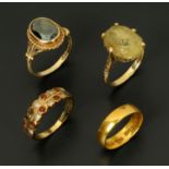 Three 9 ct gold dress rings, and a 22 ct gold wedding band.