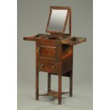 A George III mahogany square washstand, with fold over top, rear slide, cupboard door and drawer.