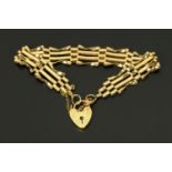 A 9 ct gold gate bracelet, with padlock and safety chain, 9.3 grams.