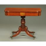 An early 19th century mahogany turnover top tea table, with brass marquetry frieze tablet,