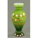 A 19th century Bohemian green glass vase, jewelled. Height 28 cm.