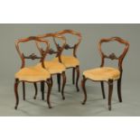 A set of four Victorian rosewood salon chairs, with foliate carved showframes, stuffover seat,