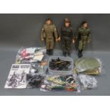 3 1970's Palitoy Action Man dolls together with a collection of outfits and accessories