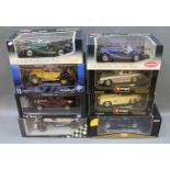A group of 8 boxed 1:18 scale diecast model cars Burago, Kyosho,
