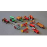 A collection of Dinky & other die cast model agricultural vehicles & appliances