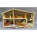 A Lundby dolls house with a quantity of dolls house furniture
