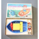 A Clifford Toys battery operated "Fishing Boy" game