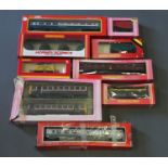 A collection of boxed Hornby coaches,