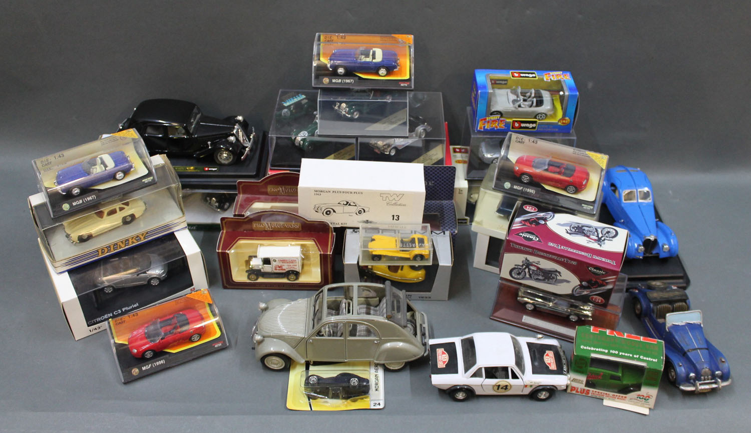 A group of boxed and unboxed Diecast model vehicles including Matchbox Dinky, Atlas Editions,