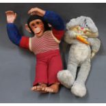 A chimpanzee soft toy & a talking Bugs Bunny soft toy