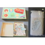 A scarce 1962 "Barbie & Ken" cut out doll set in original case/box & a Sindy bed