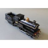 A Hornby 0 gauge 0-4-0 LMS locomotive and tender, 2710,