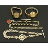 A silver Albert chain, with fob, another Albert chain and two ladies 9 ct gold cased wristwatches.