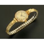 A vintage ladies Rolex 9 ct gold wristwatch, with expanding bracelet, manual. Diameter 24 mm.