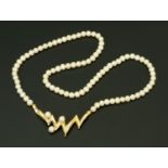 A pearl necklace, with gold, diamond and pearl set drop, stamped "585" (see illustration).