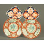 A pair of Chinese plates, diameter 22 cm, and a pair of Imari square shallow dishes, width 16 cm.