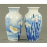 A pair of early 20th century Japanese vases, decorated with birds and iris. Height 30 cm.