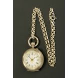 A foliate engraved silver cased fob watch, with pink ceramic dial and chain.