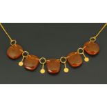 An 8 ct gold Russian amber necklace, Baltic amber, gross weight 15 grams, the clasp stamped ".