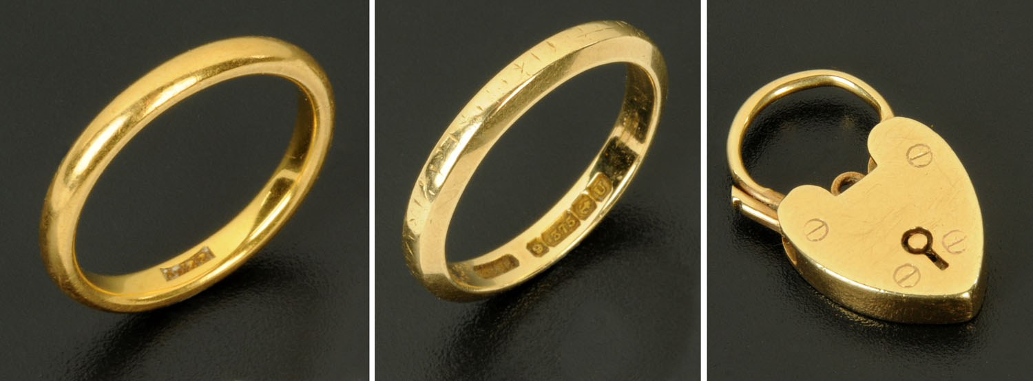 A 9 ct gold wedding band, 2.8 grams, size N, a 22 ct gold wedding band, 4.