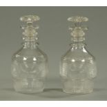 A pair of George III decanters, each with three ringed neck and mushroom shaped stopper.
