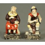 A pair of 19th century Staffordshire figures, cobbler and wife, each with square base.