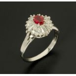 WITHDRAWN - A ruby and diamond cluster ring, ruby weight .45 carats, size N/O (see illustration).