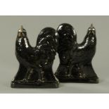 A pair of Victorian Staffordshire cockerels, black glaze with gilding. Height 30 cm.