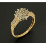 A 9 ct yellow gold diamond cluster ring, size N/O.