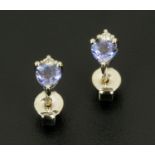 A pair of 18 ct white gold studs,