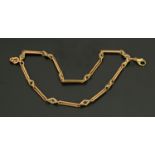 A rose gold coloured metal link chain, 12.5 grams.