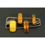A silver and amber modernist brooch, full Russian hallmarks.