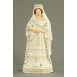 A large Victorian Staffordshire figure, Queen Victoria 1887 Jubilee. Height 43 cm.