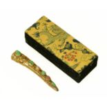 A Chinese silver gilt gem set nail guard, in the form of a brooch and with original silk lined box.