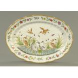 A Capodimonte "Swan Service" oval dish, mid 20th century, after the Meissen original,