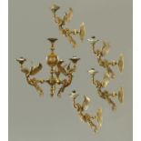 A gilt brass chandelier and four matching wall lights, with winged mermaid supports.