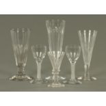 Six antique glasses, including two with air twist stems. Tallest height 20 cm.